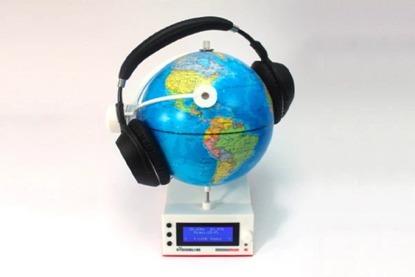 Who still listens to old-fashioned radios? It’s better to spin a globe and listen to whatever station corresponds to where you spin it.
